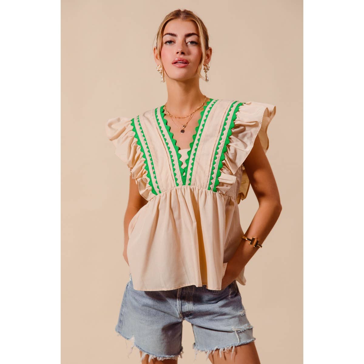 SOLID WOVEN SLEEVELESS TOP WITH WAVE TRIM
