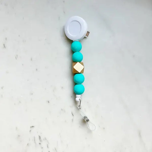 Solid Group: Turquoise Badge Reel