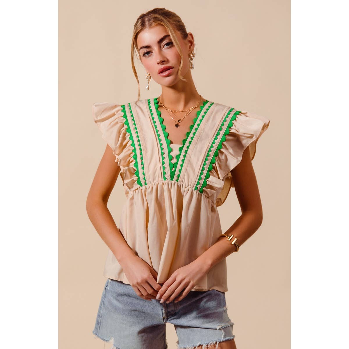 SOLID WOVEN SLEEVELESS TOP WITH WAVE TRIM